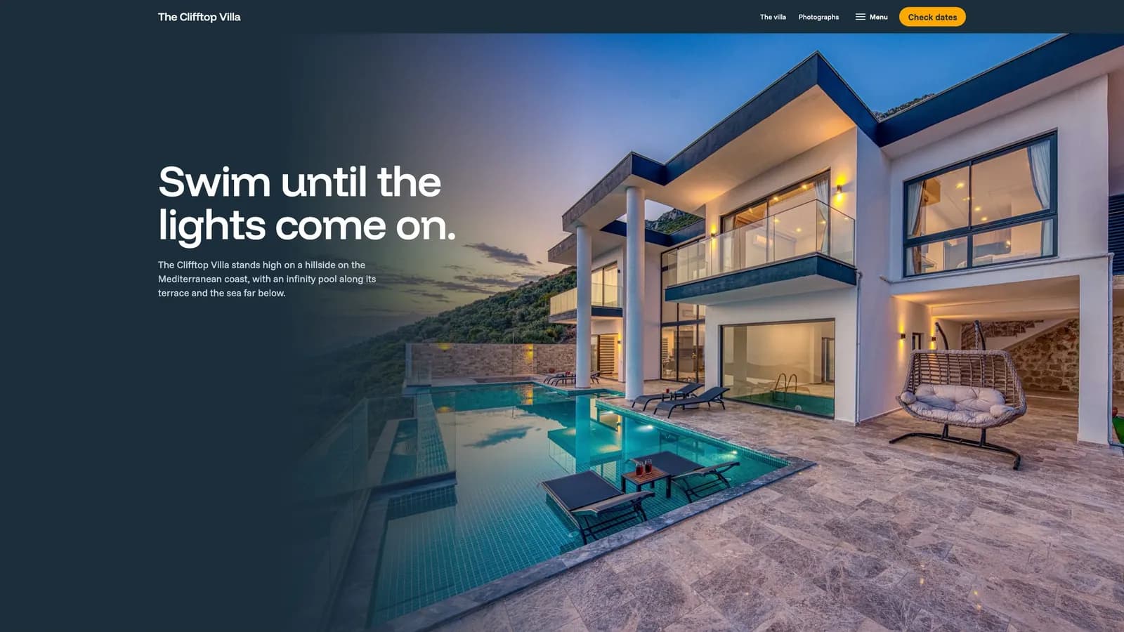 The Clifftop Villa's website on a laptop: the villa at dusk beside the words Swim until the lights come on.